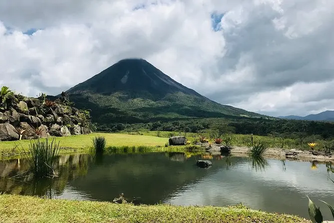 Arenal Volcano and Lake Arenal viewed from the national park trail, Costa Rica